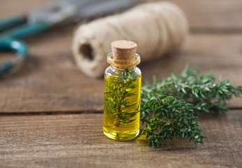 thyme oil on wooden surface