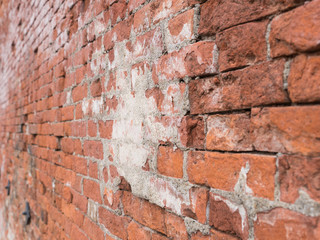 Side View of The Old Brick Red Wall