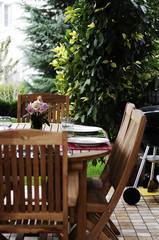 brown home garden and wooden table and chair outdoor concept