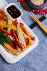 Fried slice of meat and pepper