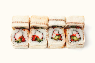 Set of unagi eel rolls isolated on white, closeup, top view