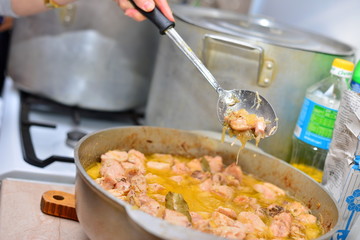 fried mushrooms with vegetables in a frying pan. on the table. close up. horizontal