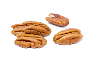 Fresh pecan nuts isolated on a white background