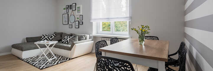 Corner sofa and wooden table