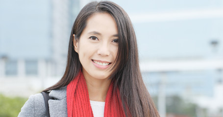 Happy woman holding shopping bag