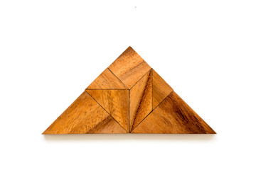 Wood tangram puzzle in triangle shape on white background