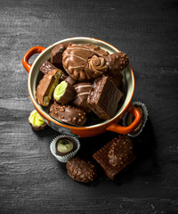Chocolate candies in a bowl. .