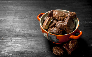 Chocolate candies in a bowl. .