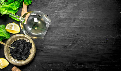 Black caviar with white wine and herbs.