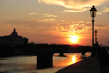 silhouette of bridge in florence sunset italy