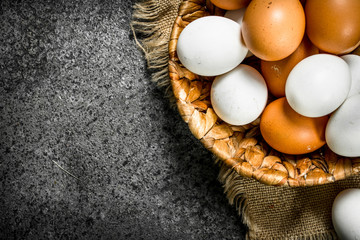 Fresh eggs in the basket.