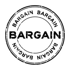 Grunge black bargain word round rubber seal stamp on white background