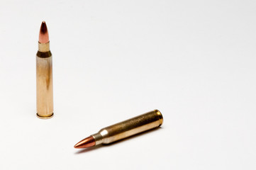 A pair of isolated 223 cartriges on a white background