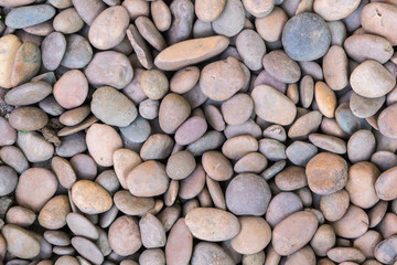 Stone pebbles texture or stone pebbles background for interior design business. exterior decoration and industrial construction idea concept design. Stone pebbles motifs that occurs natural.