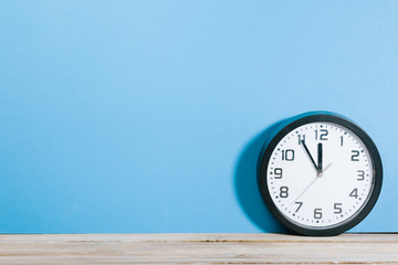 Clock on blue colored background