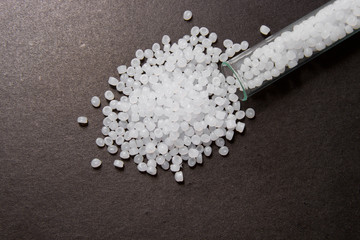 Plastic pellets. Transparent Polyethylene granules. Plastic Raw material .