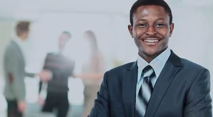 Fototapeta premium peaceful african american businessman in office