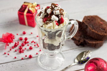 Christmas background-homemade dessert and Christmas decoration on white wooden table