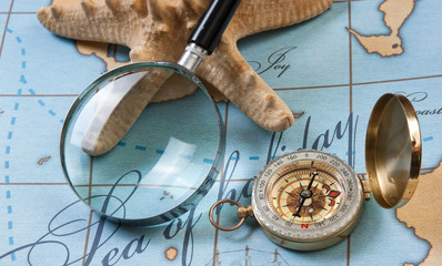 magnifier and compass on  map