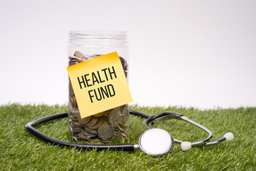 Saving for health or medical fund. Money in a jar. Saving concept.