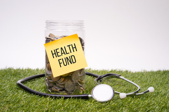 Saving for health or medical fund. Money in a jar. Saving concept.