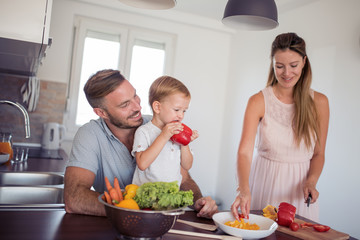 Family  preparing meal with son