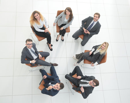 successful business team sitting in a circle