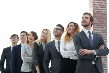 successful business team looking at copy space.