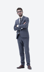 Casual young businessman standing arms crossed, smiling