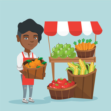 Young african-american street seller selling fruits and vegetables. Street seller standing near the market stall and holding a basket of oranges. Vector cartoon illustration. Square layout.