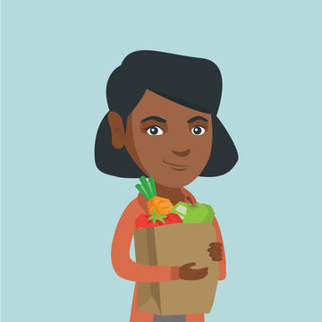 Young african-american woman holding a paper shopping bag with healthy vegetables and fruits. Smiling woman with healthy food. Concept of healthy nutrition. Vector cartoon illustration. Square layout.