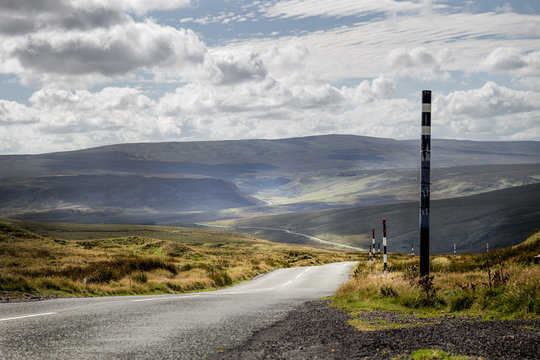 North Pennines Country Road with snow pole markers