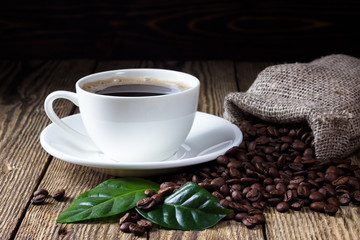 Cup of coffee on wooden rustic table