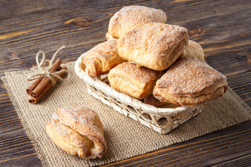 Freshly baked sugar cookies on wooden table.