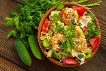  delicious gigli t with shrimps and basil on  plate