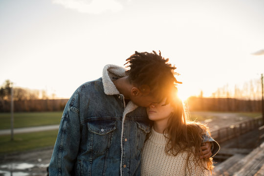 Young couple taking a walk during sunset