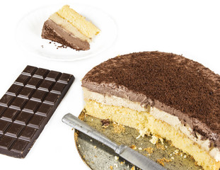Homemade cheesecake with chocolate on wooden table