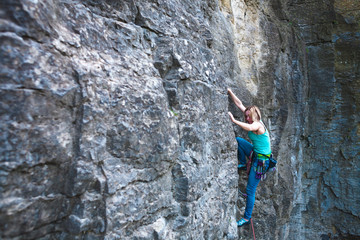 rock climber on a rock.