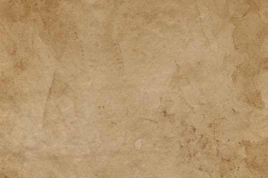 Empty stained old brown paper surface. Abstract background