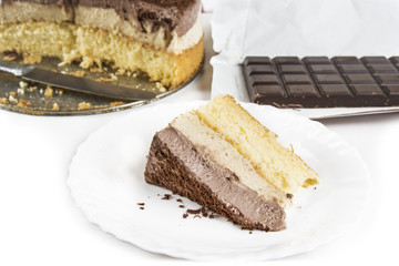 Homemade cheesecake with chocolate on wooden table