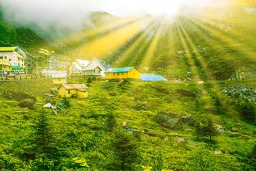 Beautiful Sun rays falling from behind the Himalayan mountain
