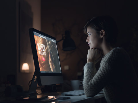 Woman watching movies and series online