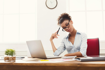 Business woman working on laptop at office