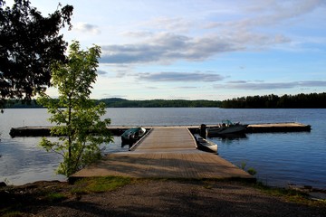 Panoramic view: Beautiful wooden pier on Lake in Ontario / Canada 