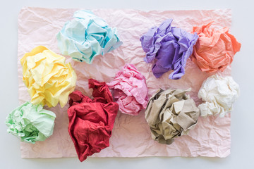 Crumpled paper balls on background