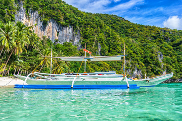 Small bangka boat on the bay of El Nido, Philippines