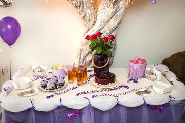 candy bar decorated by delicious sweet buffet with cupcakes and other desserts/candies,happy birthday concept