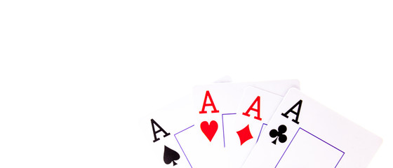 Four aces against a white background