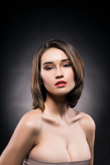 Beautiful big breasted mixed asian-caucasian race girl.