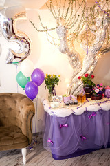candy bar decorated by delicious sweet buffet with cupcakes and other desserts/candies,happy birthday concept
